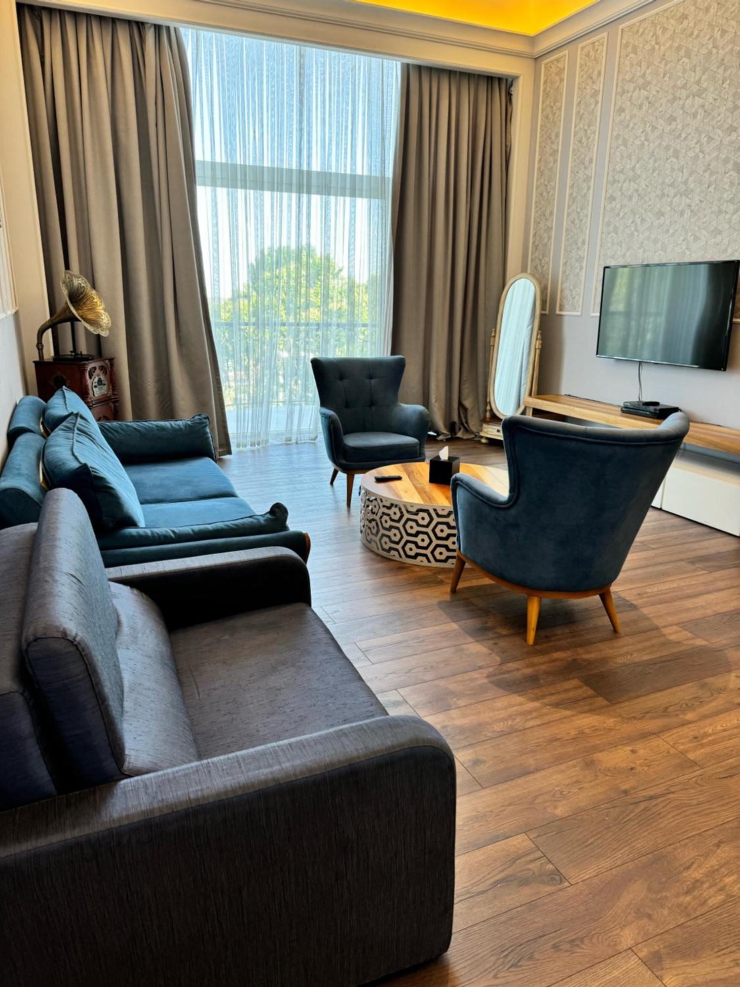 Promenade Hotel Baku Exterior photo A living room in a modern apartment
